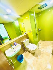 a bathroom with a toilet and a sink and a shower at VortexLuxApartman KLCC, kuala lampur city in Kuala Lumpur