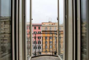 a view of a city from a window at Appartamento - Vatican in Rome