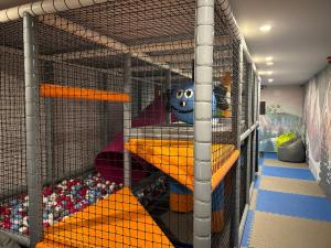 En eller flere køjesenge i et værelse på Apartamenty Royal Resort & Spa