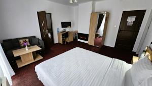 Postel nebo postele na pokoji v ubytování Casa Catalea