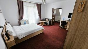 Postel nebo postele na pokoji v ubytování Casa Catalea