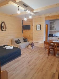 Posedenie v ubytovaní Apartament we Wsi