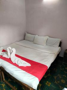 Postel nebo postele na pokoji v ubytování Neev Beach View Goa