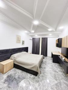 Ліжко або ліжка в номері Astara Boulevard stay