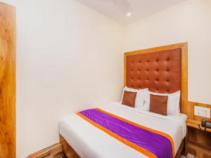 Postel nebo postele na pokoji v ubytování Hotel Era Mumbai