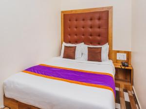 Postel nebo postele na pokoji v ubytování Hotel Era Mumbai