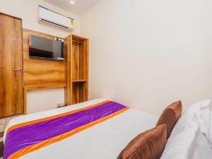 TV a/nebo společenská místnost v ubytování Hotel Era Mumbai