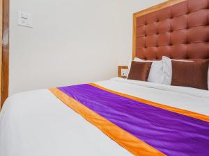 Postel nebo postele na pokoji v ubytování Hotel Era Mumbai