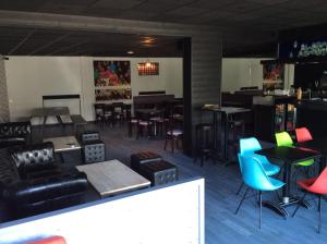 Posezení v ubytování Le Relais De La Place