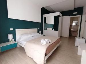 A bed or beds in a room at B & B Vittorio Emanuele