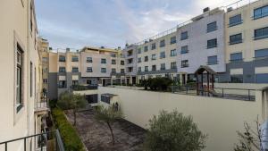 a view from a balcony of a building at 2BDR Alcântara Nest by LovelyStay in Lisbon