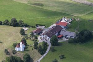 an aerial view of a house in a field at Bio Ferienhof Heiler in Feldkirchen-Westerham