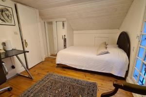 Letto o letti in una camera di Pretty House 15mn from Eiffel Tower and Versailles