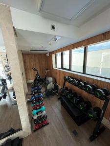 an overhead view of a gym with a bunch of bottles at BSB STAY Flats particulares - CULLINAN in Brasilia