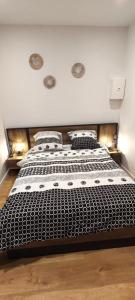 Posteľ alebo postele v izbe v ubytovaní Appartements - Halles Brauhauban Tarbes