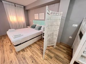 Posteľ alebo postele v izbe v ubytovaní Nuestra Casita de Marmoles Parking Incluido 2 bicis gratis