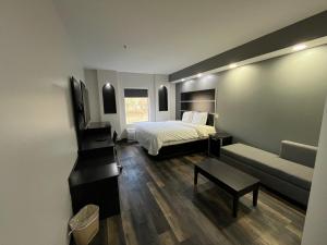 Ένα ή περισσότερα κρεβάτια σε δωμάτιο στο Sonesta Essential Savannah +48 φωτογραφίες