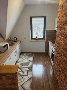 Kuchyň nebo kuchyňský kout v ubytování Apartament u Mrugały
