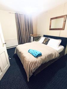 Krevet ili kreveti u jedinici u okviru objekta Beautiful 1-Bed House in Leeds