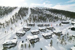 an aerial view of a resort in the snow at Exklusiv ski in-ski out stuga, i Hundfjället Sälen in Sälen