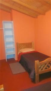 Posteľ alebo postele v izbe v ubytovaní Cabaña en Valdivia