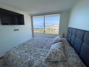 מיטה או מיטות בחדר ב-Departamento Moderno con Vista Privilegiada al Mar