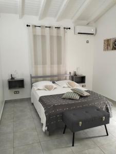 Postel nebo postele na pokoji v ubytování Villa Mircene