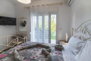 Postel nebo postele na pokoji v ubytování Casa Nikolou Stegna