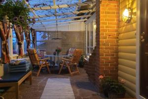 Patio nebo venkovní prostory v ubytování Trevligt hus/stuga i Svärtinge