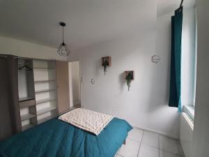 Postel nebo postele na pokoji v ubytování Maisonnette abj