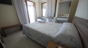 Postel nebo postele na pokoji v ubytování Sol Nascente Hotel Pousada Beira Mar