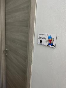 Certifikát, hodnocení, plakát nebo jiný dokument vystavený v ubytování La casa di Cate & Adry