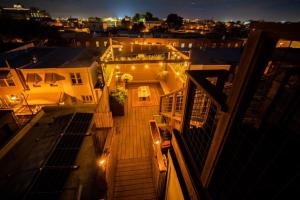 a view of a balcony of a building at night at Double Decker Roofdeck Gorgeous View in Passyunk in Philadelphia