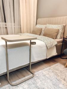 Кровать или кровати в номере Closer Place