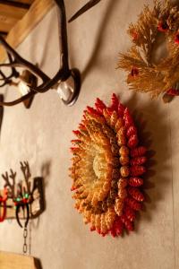 a decoration on a wall with a pineapple on it at BIESIADA in Korbielów