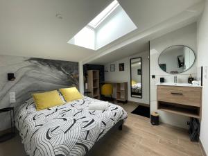 מיטה או מיטות בחדר ב-Résidence Tamaris Loft House