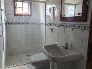 Ένα μπάνιο στο CASA ACONCHEGANTE TEMPORA CARAGUATATUBA