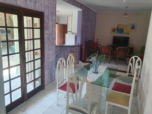 Μια τηλεόραση ή/και κέντρο ψυχαγωγίας στο CASA ACONCHEGANTE TEMPORA CARAGUATATUBA