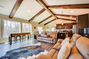 A seating area at Roaring River Retreat with Home Gym and Fireplace!