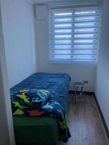 Łóżko lub łóżka w pokoju w obiekcie Maravilloso Departamento en Llanquihue