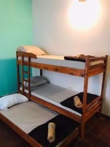 a group of bunk beds in a room at Grecovich House in Encarnación