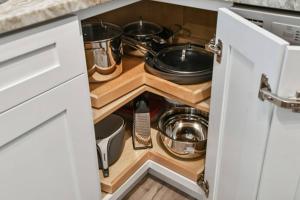 a kitchen with a stove with pots and pans at Chic & Cozy 3 Bed/2 Bath House Near Beaches in Largo