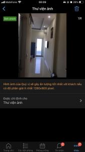 a screenshot of a room with a hallway with a door at Homestay 05 in Vung Tau