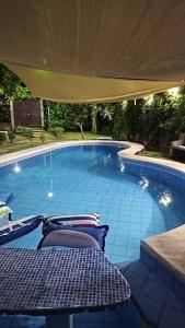 Swimmingpoolen hos eller tæt på Casa de playa “mi lancho”