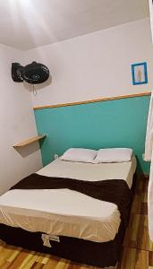 Säng eller sängar i ett rum på Casa de férias