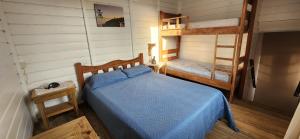 En eller flere senge i et værelse på Apartamento aconchegante e confortável