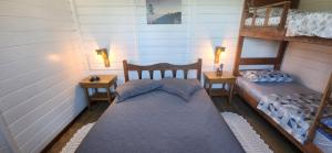 En eller flere senge i et værelse på Apartamento aconchegante e confortável