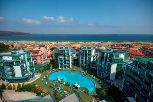 an aerial view of a resort with a swimming pool at Paradise Apartments Primorsko in Primorsko
