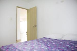 Postel nebo postele na pokoji v ubytování Apartamento en Valledupar - Casa Canaán