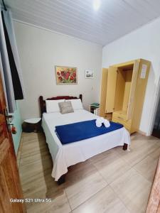 Postel nebo postele na pokoji v ubytování Pousada del Sole